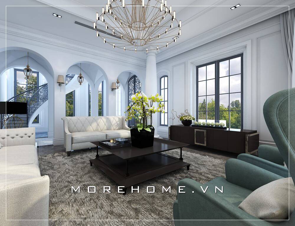 Bộ sofa tân cổ điển kiểu dáng văng tiện nghi cùng vỏ bọc vải màu trắng tinh tế là điểm nhấn ấn tượng của phòng khách nhà phố